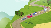 Derby carts racing down a hill S6E14