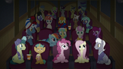 Movie-watching ponies stare at Team Ponyville S9E6