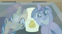 Twilight and Sunburst find an antique seashell S7E24