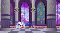 Princess Celestia and Princess Luna looking at the beams of the restored Crystal Heart.