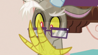 Discord looking at his transparent claw S7E12