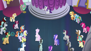 Crowd of ponies listening to Rarity S5E14