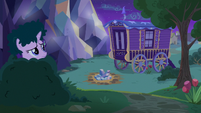 Starlight camouflaged and looking at Trixie's wagon S6E25