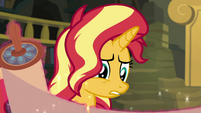 Sunset Shimmer looking at the drawings EGFF