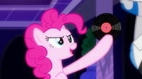 Pinkie Pie holding a vinyl record S6E9