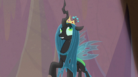 Queen Chrysalis wearing a toy crown S9E8