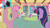 Twilight and Fluttershy, watching Rarity.