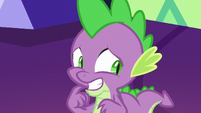 Spike nervously smiles and looks away S7E15