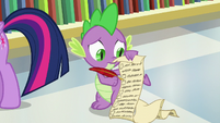 Spike pointing a quill at the schedule S7E3