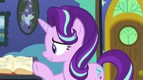 Starlight Glimmer pointing at her book S8E3