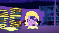 Filly Twilight trying to turn the page using her magic S1E23