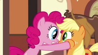 Pinkie Pie grabbing on Applejack's head S2E24