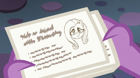 Spike reads Starlight's lesson card about Fluttershy S6E21