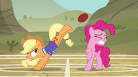 Applejack bucks the ball while Pinkie flinches S6E18