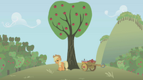 Applejack, trying to buck a tree.