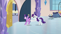 Rarity pushing Twilight out of the spa S03E12