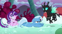 Starlight, Trixie, and Thorax in a chaos landscape S6E25