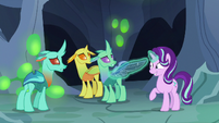 Starlight Changeling stretches a changeling's wing S7E1