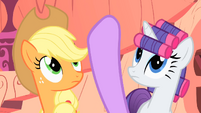 Twilight pointing behind AJ and Rarity S1E08