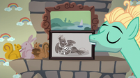 Zephyr puts a self-portrait over the fireplace S6E11