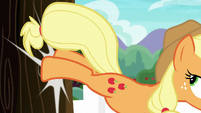 Applejack bucking a tree S6E22