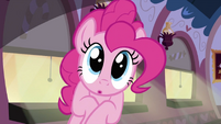 Pinkie looking at the MMMM cake.