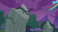 Rainbow Dash flying backward from the rock S7E25