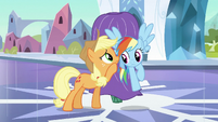 Whispering in Dash's ear.