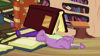 Spike with the book covering his head S3E03