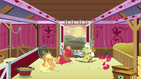 Apple family laughing together in the barn S6E23