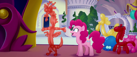 Pinkie Pie ties a Discord balloon MLPTM