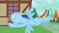 Rainbow Dash flying around the corner S7E23