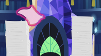 Tall stack of princess paperwork S7E22