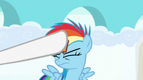 Laurette sticks sticker to filly Rainbow's forehead S7E7