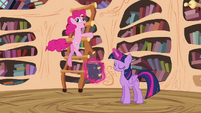 Pinkie Pie spinning around with the ladder in the library S4E18