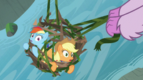 Rainbow and AJ look up from their cage S8E9