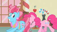 Getting a push from Pinkie Pie.