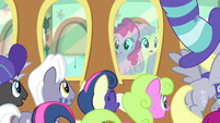 Pinkie and Fluttershy looking at their fans S6E18