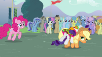 Watching from the crowds, behind Dr. Hooves.