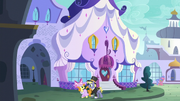 Ponet and Golden Harvest walking past the Canterlot Carousel S5E15