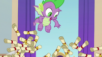 Spike watches the pile of scrolls collapse S8E15