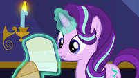 Starlight Glimmer takes letter out of envelope S6E25