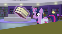 Unicorn Twilight levitating some books S9E5