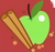 Apple and two cinnamon sticks