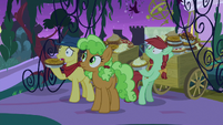 Appleloosa ponies about to eat the food S9E17