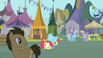 Dr. Hooves Looking at Apple Bloom.