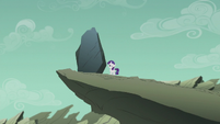 Filly Rarity staring at giant rock S5E25