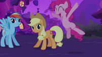 Pinkie's flying in the air.