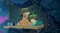 AJ tucks Apple Bloom in her sleeping bag S9E10