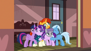 Starlight and her friends in a big group hug S7E24